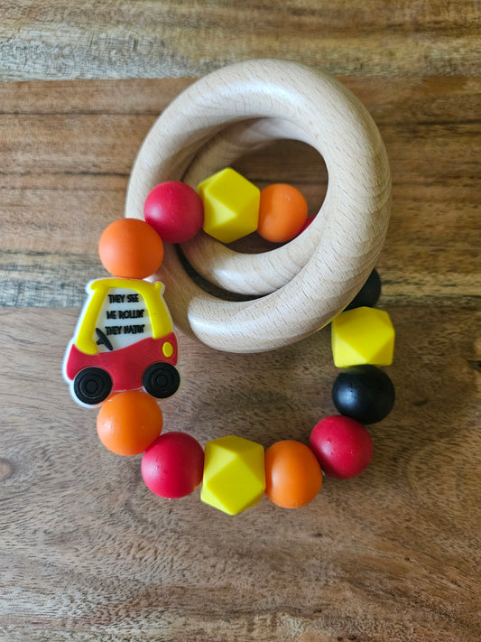They See Me Rollin' Silicone Teether Rattle
