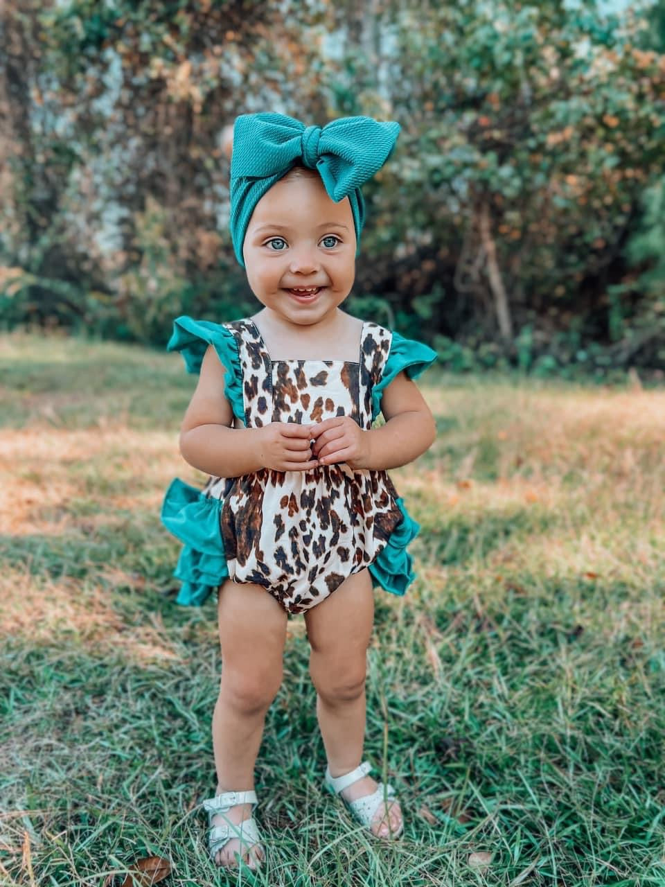 Cowhide and Turquoise Ruffle Romper