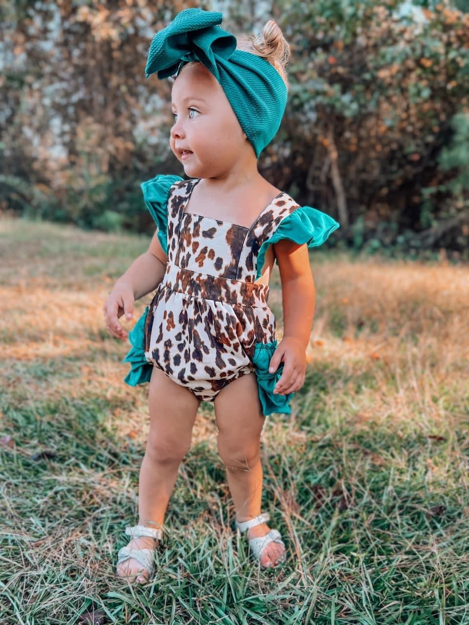 Cowhide and Turquoise Ruffle Romper